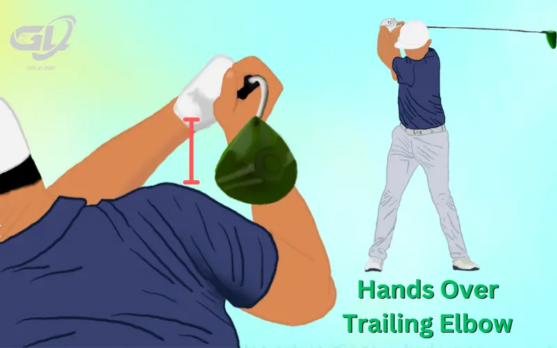 hands sit above the trailer shoulder at the end of the bacskwing